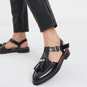 ASOS DESIGN Moving leather tassel flat shoes in black